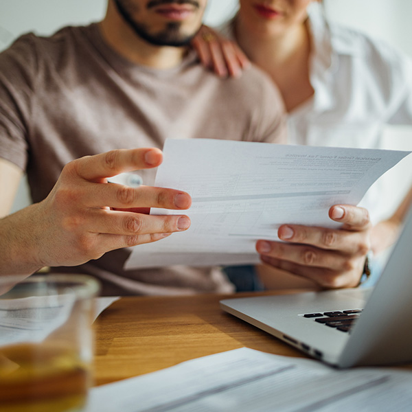 Couple Paying Bills at Home